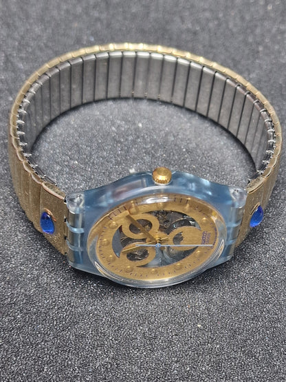 🕒 Swatch Flex GN123 “Gold Smile” (1992) – Rare Vintage Skeleton Watch