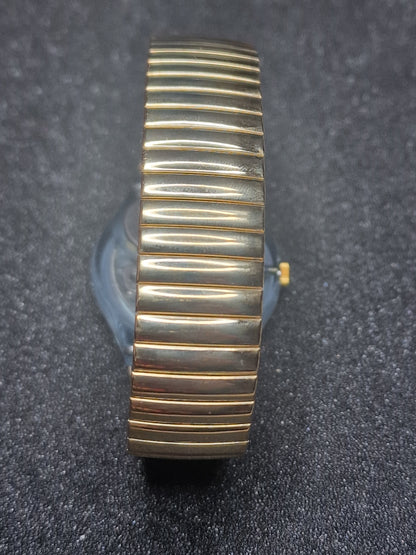 🕒 Swatch Flex GN123 “Gold Smile” (1992) – Rare Vintage Skeleton Watch