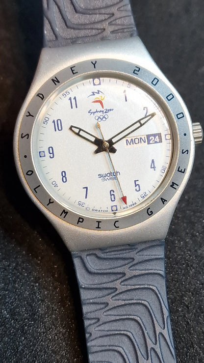 🌍 Swatch Irony Aluminium “Sydney 2000 Olympic” YGS7004 – Big Backfire (2000)