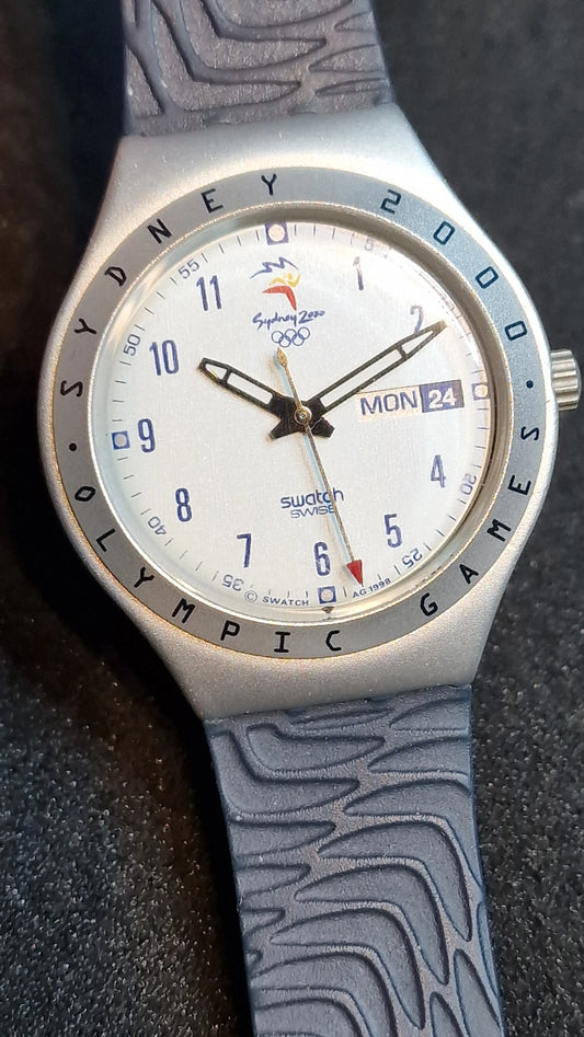 🌍 Swatch Irony Aluminium “Sydney 2000 Olympic” YGS7004 – Big Backfire (2000)
