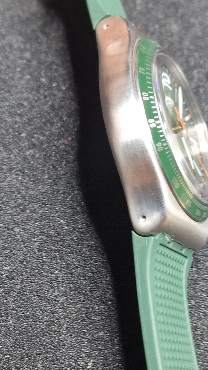 🌲 Swatch Irony Chrono YVS462 “Forest Grid” (AG2019) – Green/Orange – Swiss Made